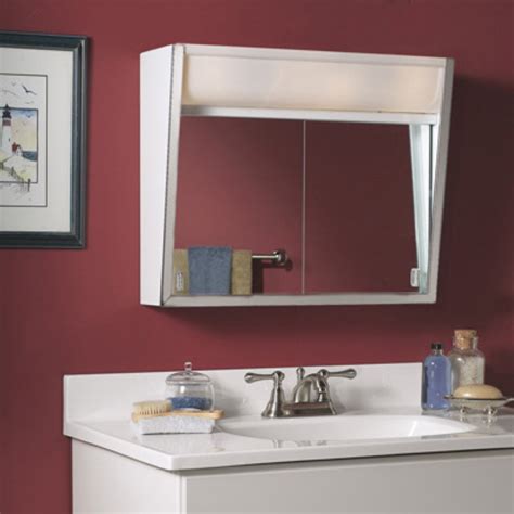 Jensen medicine cabinet - The Jensen 1459G Horizon series medicine cabinet features a frameless 16”W x 26”H beveled edge mirror door. The recessed cabinet is made of formed and welded steel in a basic white finish with a rough opening wall opening of 14”W x 24”H. Included are two adjustable glass shelves to accommodate your needs and can be mounted with a left hand or right hand swing